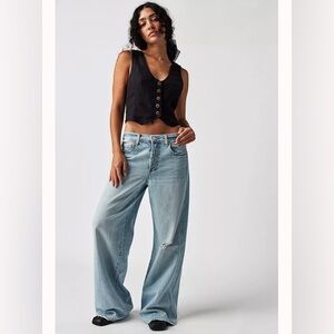 AMO Big Boy Light Blue Wide-Leg Jeans
Waist 25
Inseam 30 1/2”